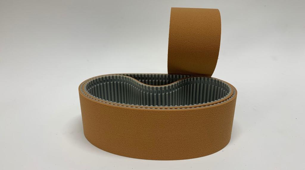 Timing belt with brown sylomer coating Timing belt with brown sylomer coating